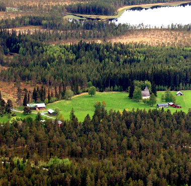 Prästbolet och gamla kyrkan